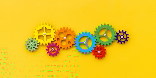 colorful gears working together standardize whole b2b systems